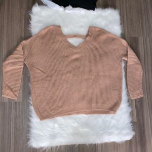 NEW without tags never worn open v-neck back baggy sweater.